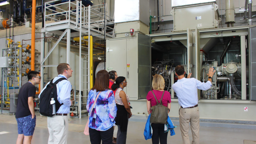 A picture of a tour taking place at the Centennial Campus Utility Plant.