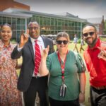 Chancellor Kevin Howell (center) spent time during Employee Appreciation Week greeting members of the Wolfpack community