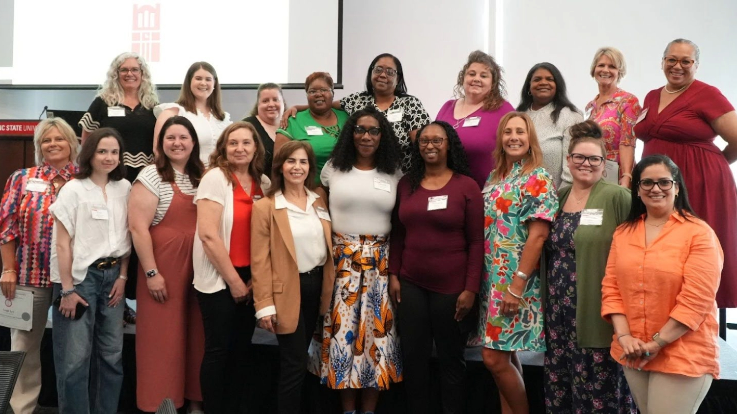 18 of 27 graduates of the 2025 Administrative Professionals Program and program manager Carina Lockley pose for a picture after a graduation ceremony in May. The graduates are (front row left to right): Leigh Lee, Trish Sandman, Melinda Warshawsky, Rhonda Bennet, Nada Taylor, Camille Goodridge, Myisshia Baldwin ,Donae Yoos, Hannah Tolbert and Jamy Santiago; (back row left to right) Christine Sherman, Erin Elliott, Jennifer Shumway, LaToya Lucy, T’sha Wilson, Samantha Lusk, Pamela Jordan and Sherry Lynn.