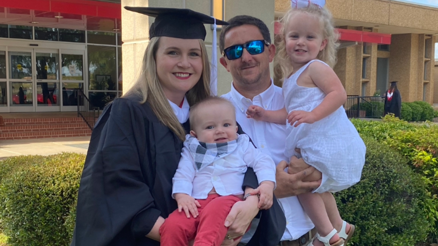 A picture of Alycia Thornton, senior director of philanthropy in the College of Agriculture and Life Sciences, and her family: her son, Hampton, her husband, Eric, and her daughter, Anna Claire.